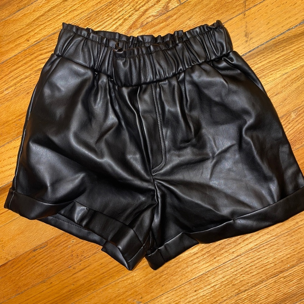 Black leather shorts